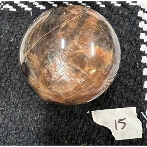 Gorgeous flashy black moonstone crystal stone sphere - 2.5”